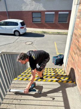 Installation of anti-slip stair treads, panels, strips and ladder rungs
